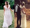 2021 Boho bröllopsklänningar En linje Backless Scalloped V Neckline Lace Golv Längd Kort Cap Sleeves Beach Wedding Gown Vestido de Novia