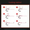 4pcs / set Hameçons de pêche fluorescents à haute teneur en carbone Carp Spherical Feeder Bomb Proof Hanging ExplosionHook Tool Spring Anti-winding Explosion Hook