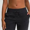 Vävt ficka yoga outfits byxor lösa joggare snabbt torkning elastisk springa fitness sport casual gym kläder dragsko kvinnor trosor leggings tight