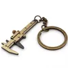 Nyckelringar 1pc Fashion Car Key Mini Vernier Caliper Portable 0-40mm Keychain Mätmätare Verktyg Turbo Chain Ring Linjal