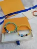 Pulseiras unissex de pulseira unissex de designers para homem jóias femininas jóias de bracelete ajustável 4 coloros300o