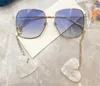 Mode designer solglasögon för kvinnor 1031 metall vintage fyrkantig ram söt tvättbjörn hänge glasögon trend stil toppkvalitet anti-ultraviolett