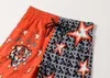 22 Últimos pantalones cortos de diseñador de ropa para hombres Ropa de calle de moda de verano Ropa Traje de baño de secado rápido Pantalones de playa de tablero impreso # M-3XL # 16