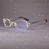 2023 Tasarımcı Gözlükleri Bilgisayar Kadın ve Erkekler Gözlük Modeli Rimless Şeffaf Dekorasyon Aksesuarları Okumak İçin Yeni Açık Gözlük Çerçevesi