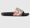 Designer kvinna G Tofflor män tofflor Gear underdelar Flip Flops kvinnor lyxiga sandaler mode causal skor storlek 35-42 med låda