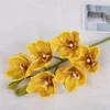 Um Silício Oriental Cymbidium Orchid Flower Artificial de boa qualidade traça Phalaenopsis borboleta orquídea 6 cabeças