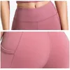 Legginsy z Pockets Pants for Women Yoga Gym Fitness Running Sport Płynne legginsy Jogging Pantalones High Tail Pant1238755