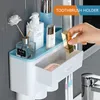 ONEUP 3 colores Soporte para cepillo de dientes Exprimidor automático de pasta de dientes Dispensador Montaje en pared Estante de almacenamiento para accesorios de baño para el hogar LJ201128
