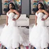2023 Sexy African Mermaid Wedding Dresses Sweetheart Illusion Lace Appliques Crystal Beaded Ruffles Tiered Organza Formal Bridal Gowns