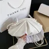 Totes couleur unie 2021 mode haute qualité en cuir femmes sac à main design perle bandoulière sac de messager