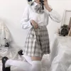 Japanese Preppy Style Orthodox Pleated Skirt School Student JK Uniform Short Skirts Grid Hight Waist Women's Pocket Bust skirt 201109