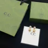 Diseñador de lujo Pendientes para mujer Pendientes de moda Pendientes de trébol Inoxidable Elegante para mujer Letras de marca clásica 2202103D