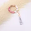 Wholesale foreign trade food grade silicone beads wrist keychain alloy cap PU leather tassel keychain female multicolor optional