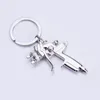 500pcs Ny varmvattenspraypistol Kvalitet Business Zinc Alloy Keychain Fashion Handväskor Tillbehör Gåva