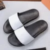 Designer tofflor män kvinnor glida sandaler lyx glida sommar mode bred platt hala med tjocka flip flops storlek 36-45