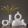 Europa biała porcelanowa rzemiosło ceramiczne wazon kreatywny mały kwiat ozdoby wazonowe tabletop wazony domowe prezenty ślubne T200703