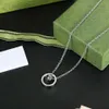 Oude dubbele ringketting voor mannen en vrouwen, een titanium stalen hiphop-transferkralenhanger met de officiële website