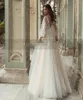 Ny Princess Boho Bröllopsklänningar Appliques Lace Backless Beach Bride Dress Long Puff Sleeves Plus Size Bridal Gown