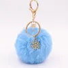 POM Keychain met sneeuwvlok hanger charmes harige donzige pluche ball sleutelhanger voor vrouwen meisjes tas accesso ornament vakantie cadeau1