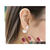 Mode Koreaanse stijl Tweezijdige witte parel -imitatie Parelsstuds voor vrouwen boetiek klassieke dubbele kanten Pearl stud oorbellen R02H2