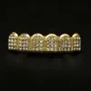 Produttori di griglie Grillz in oro reale inseriscono una protesi diamantata con set di denti per gioielli hip-hop in oro
