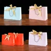Square Bottomed Packaging Bag Solid Color Bow Silk Ribbon Paper Packing Package Gifts Party Ceremony Handbags Beautiful 2 3kz N2