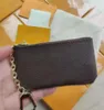 10A kvalitetsdesigner äkta lädermynt förföljer nyckelpåse pochette cles mode handväska kvinnor herr kreditkort hållare lyx plånbok väska