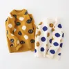 Vêtements pour enfants garçons bébé filles pull tricoté 2020 manteau d'hiver nouvelle version coréenne des visages souriants des enfants plus velours
