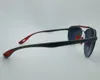 Rimless driving sunglasses racing style metal nylon fiber frame shield logo red yellow rubber temple hole detail design Includes l6183449