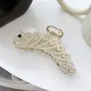 Morsetti in metallo con strass di perle da donna coda di pavone a forma di osso di pesce grande artiglio per capelli nuovo copricapo di temperamento