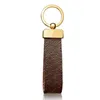 Keychains rostfritt stål Nyckelhållare Brown Flower Key Chain Ring Holder Buckle Keychain Designer Handgjorda svarta läderväskor Acces6565582