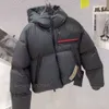 Women's Down Parkas Popular Designer Jacket huva högkvalitativa damer Budge Triangle LR-HX021-MK2 TEC REC Eggshell Tyg Kort Lång ärm WKD7