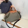 Duffel Taschen Freizeit Nylon Reisetasche Frauen und Männer Outdoor Große Kapazität Falten Fitness Tragbare Yoga Mode Gepäck Boarding238i