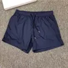 Summer Men Nylon Swim Shorts Diseñador de moda Gentleman Pockets laterales Swimear Boy Cierre de la cremallera Back Pocket Drawcord Pantalones cortos