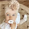 18色新しい素敵な花の赤ん坊の帽子ソフトベビーガール帽子ターバン幼児幼児生まれたばかりの赤ちゃんキャップボンネットヘッドラップ子供キャップビーニー