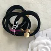 klassiek fluwelen materiaal rond metaal gegraveerd 2C elastische band mode haarband klassiek haartouw V cadeaucollectie accessoires gebruiken als beugel