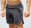 ht Moda Uomo Pantaloncini sportivi da spiaggia Pantaloni Pantaloni sportivi da bodybuilding in cotone Fitness Short Jogger Palestre casual Pantaloncini da uomo