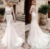 Moderna Lace Mermaid Bröllopsklänningar Sexig Sheer Open Back Appliques Långärmad Trumpet Bröllopsklänning för Bride 2022 Brudklänning