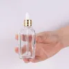 Transparente, klare 20 ml ätherische Öle, quadratische Tropfflasche, 10 ml, 30 ml, 50 ml Glas-Serumflaschen mit Goldverschluss für Kosmetika