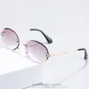 Frameless Trimmed Women Sunglasses Fashion Small Round Sun Glasses Metal Temples 7 Colors Wholesale