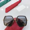Damskie okulary przeciwsłoneczne dla kobiet męskie okulary przeciwsłoneczne męskie 0106 Fashion Style chroni oczy UV400 soczewki najwyższej jakości z etui