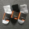 orange athletische socken