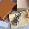 Stylish Astronaut Key Chain Designer Titanium Steel Matching Gift Box300u