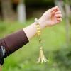 Bracelet en bois avec pompon et perles en silicone de qualité alimentaire pour femme et fille