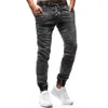 Män jeans män mode elastisk lös för unga långa byxor casual manlig rak stråle fötter byxor224d