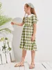 Meisjes Peter Pan Collar Puff Sleeve Gingham Jurk Zij