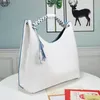 5A 디자이너 토트 백 Luxurys 최고 품질의 가죽 숄더 백 Taurillon Original Edition 편지 꽃 핸드백 진짜 디자이너 Carmel Hobo Bags