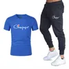 2022 Sommar Mode Leisure T-shirt + Byxor Mäns Set Tracksuit Sportkläder Track Passar Man Sweatsit Kortärmad Vit Svart T-shirt