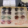 Óculos de sol para homens e mulheres designer estilo VA2043 anti-ultravioleta placa retro forma redonda moldura completa moda caixa aleatória
