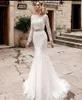 Abiti da sposa moderni a sirena in pizzo Abiti da sposa a tromba a maniche lunghe con applicazioni trasparenti trasparenti sul retro Abiti da sposa per la sposa 2022 Abito da sposa